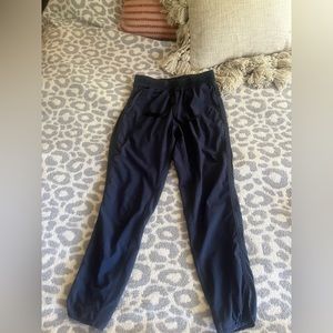 Navy blue ankle length lululemon pants/joggers.